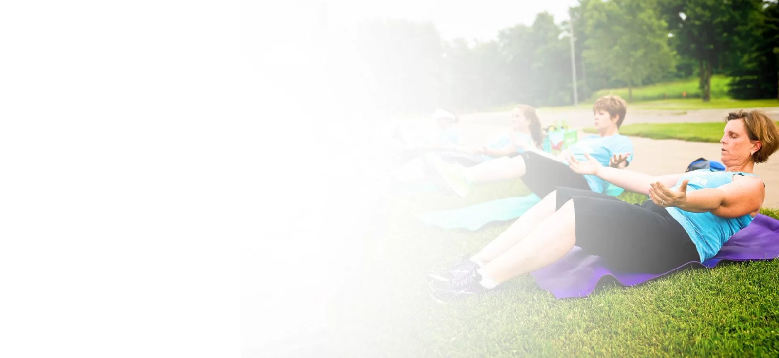 Women doing sit-ups for strength training
