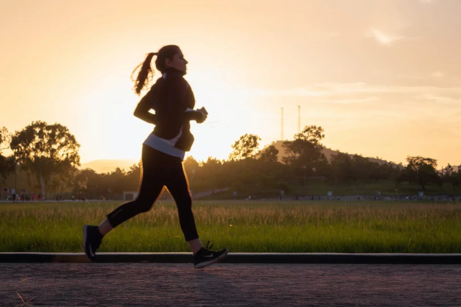woman running at sunrise