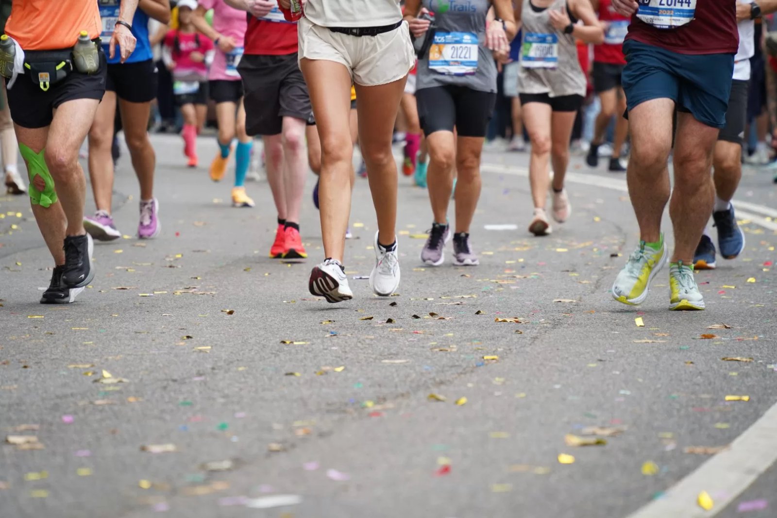 large group of running legs, perhaps running a marathon